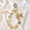 Vogue Strap: Marble Bead Bow Charm Bracelet Phone Accessory (Color Ships Assorted)