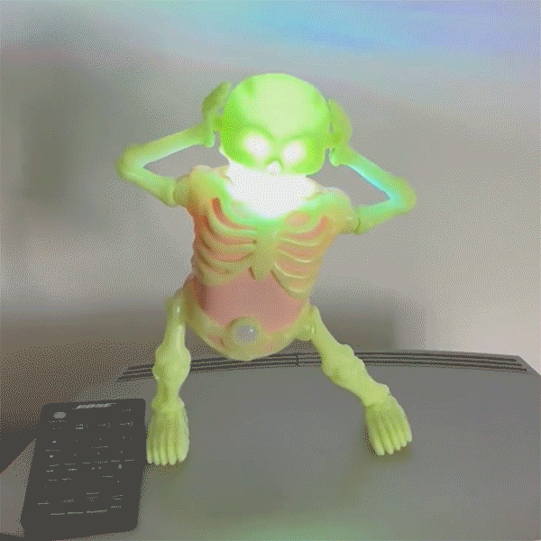 SkellyVibes Glow-In-The-Dark Dancing Skeleton - Lights Up & Laughs! Simple Exclusive 